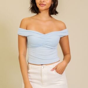 Blusa timing con hombros caídos