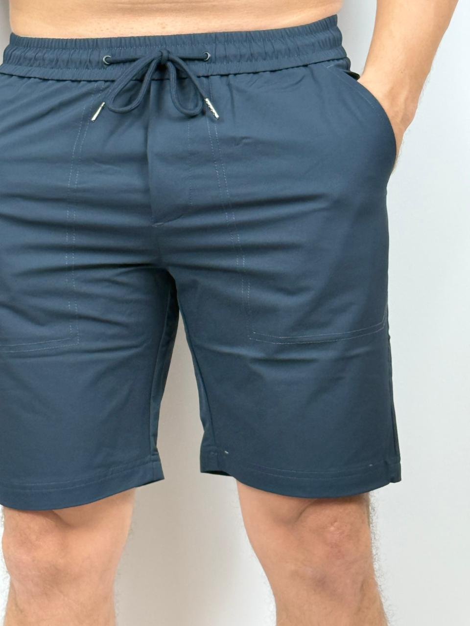 SHORT LISO CON ELÁSTICO EN LA CINTURA BLOCK - Imagen 14